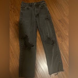 Women’s black ripped jeans